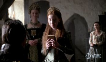 Anne of Cleves looks upon her adopted daughter Elizabeth