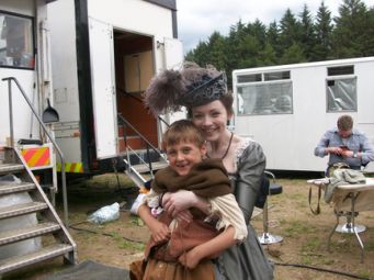 Sarah Bolger with extra on set