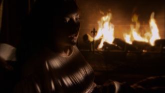 anne awakening by fireplace